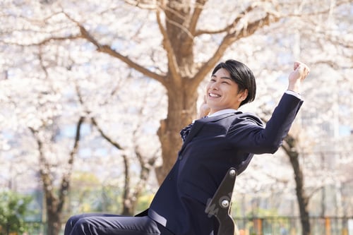 Preview: Japanese male businessman doing a banzai.