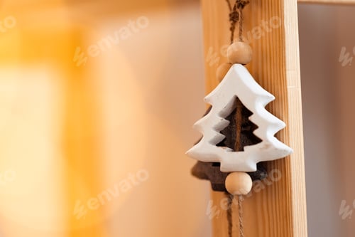 Preview: Christmas decoration hanging on a wooden background