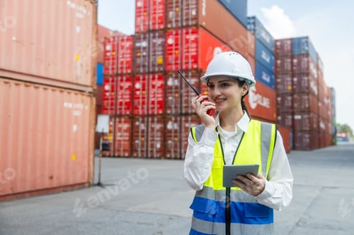 Preview: Engineer port manager communicating in container yard