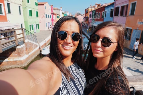 Preview: Young women travellers selfie in burano Venice Italy