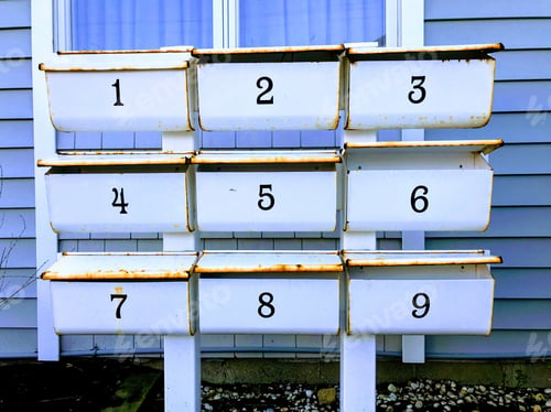 Preview: Nine white mail boxes