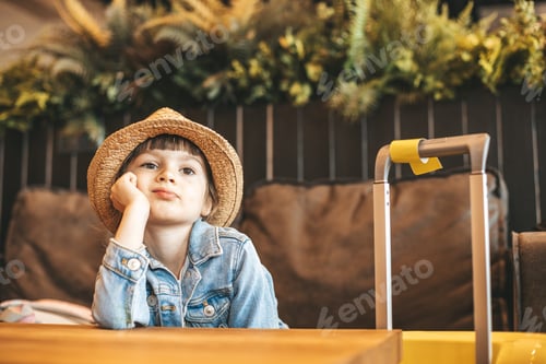 Preview: Bored little girl at the airport