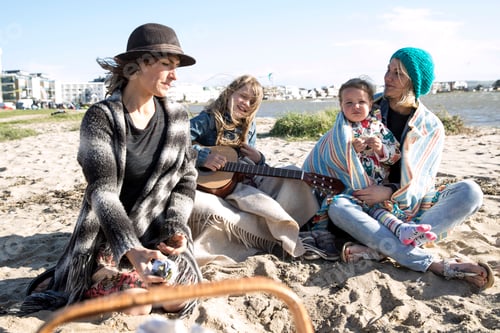 Preview: Sisters and their children enjoying beach