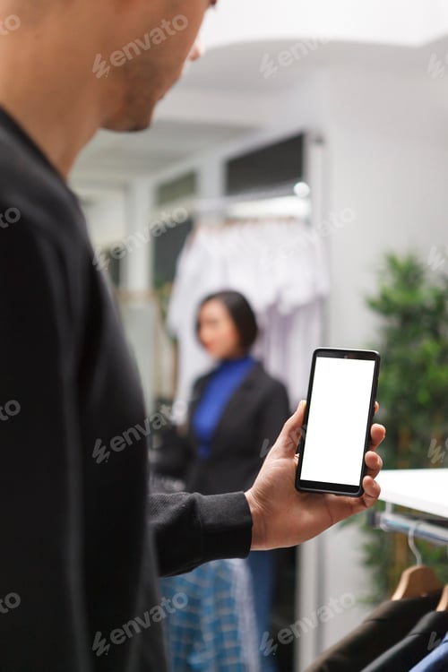 Preview: Customer holding phone with blank screen