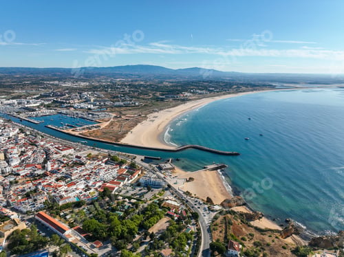 Preview: Aerial panorama of Lagos marina and Meia Praia beach