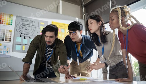 Preview: Group of business people team meeting in modern office working design planning