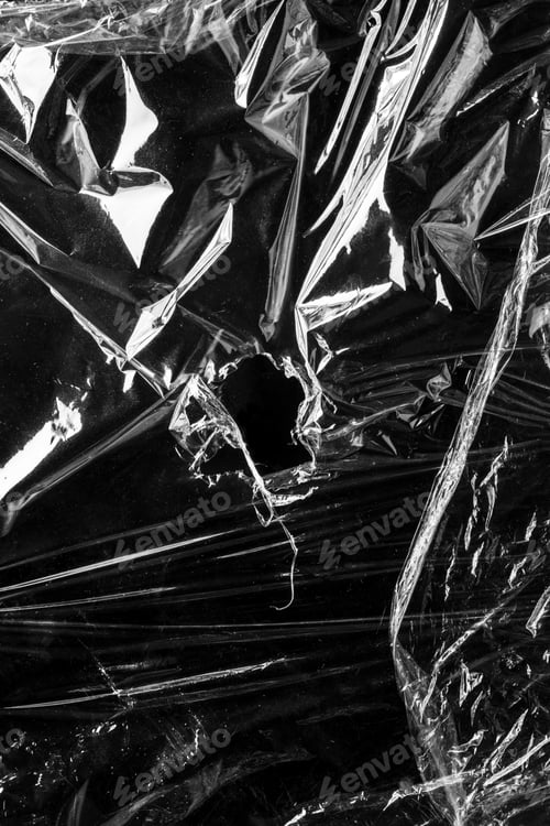 Preview: Wrinkled plastic wrap texture on a black background