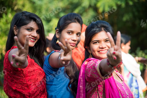 Preview: Happy Indian young girls smiling and having fun at outdoor.