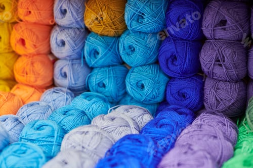 Preview: Yarns or balls of wool on shelves in store for knitting