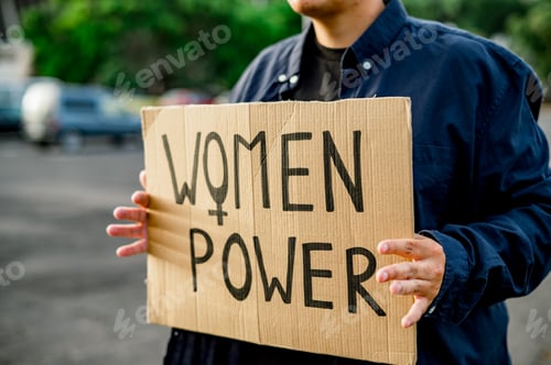 Preview: Crop protester with placard on street