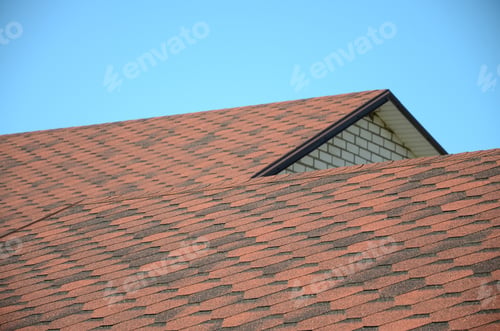 Preview: The roof is covered with bituminous shingles of brown color. Quality Roofing