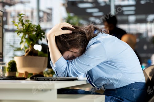 Preview: Young employee deals with emotional strain and frustration of business failure