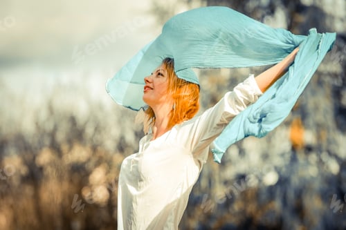 Preview: Beautiful girl with a blue scarf