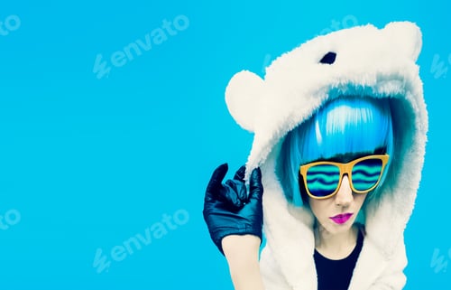 Preview: Crazy party girl in hoodie bear on a blue background. positives