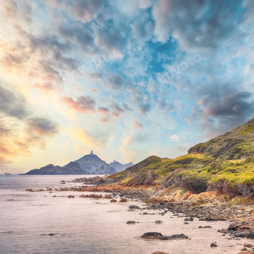 Preview: Sunset over popular tourist destination Torra di a Parata with Genoese Tower