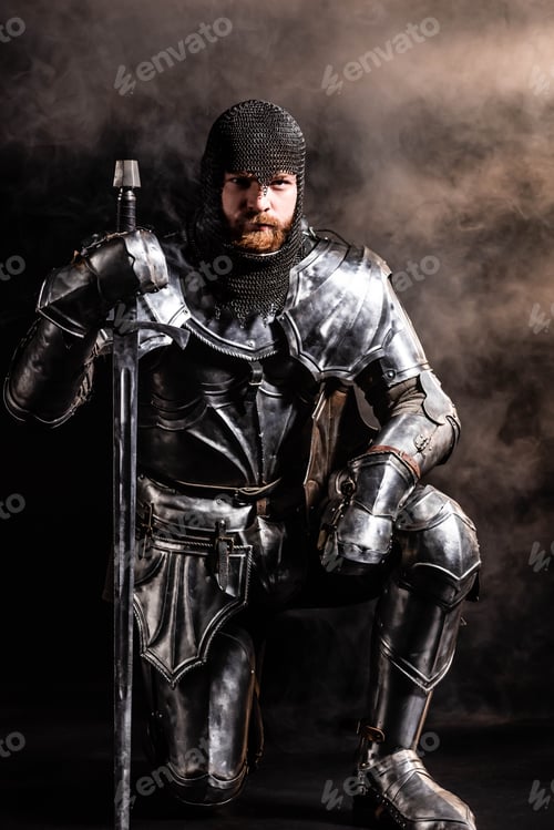Preview: handsome knight in armor holding sword and bend knee on black background