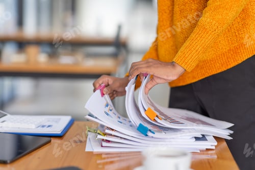 Preview: Business Documents, Auditor businesswoman checking searching document legal prepare paperwork or