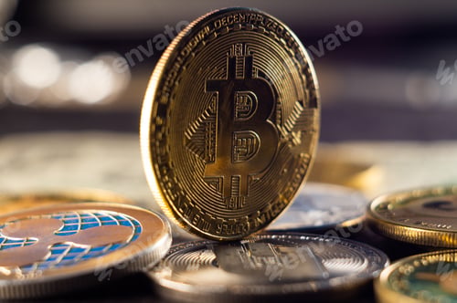 Preview: Concept of a cryptocurrency with golden coins on a black surface