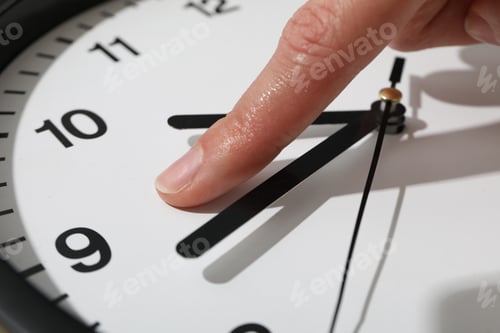 Preview: Concept of time change with clock, close up