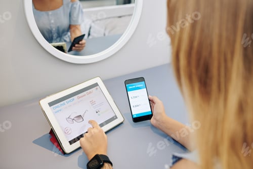 Preview: Woman ordering sunglases online