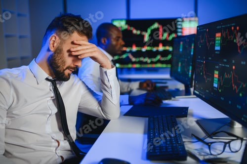 Preview: Conception of teamwork. Team of stockbrokers works in modern office with many display screens