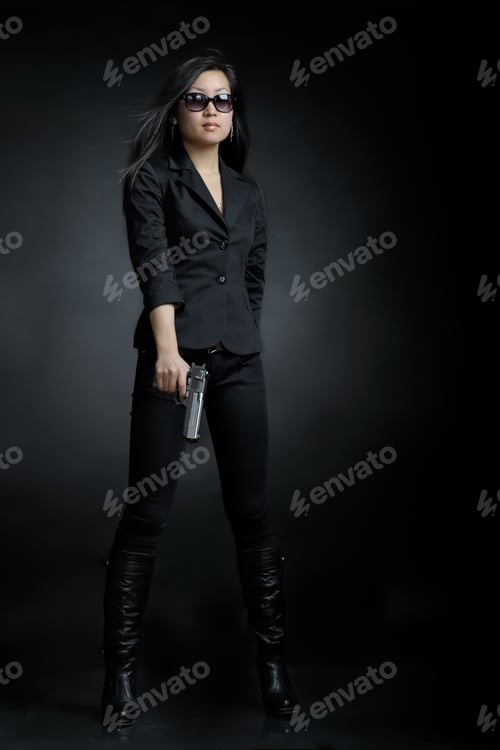 Preview: Asian Woman With A Pistol