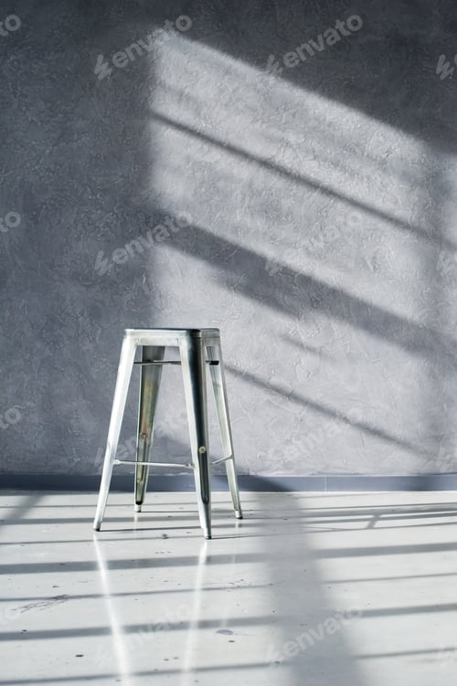 Preview: Steel chair in the interior of a black loft Studio. 10.11.2019 USA, New York