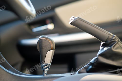Preview: Closeup of car automatic transmission gear stick. Detail of vehicle interior