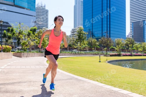 Preview: Woman running at the park