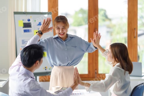 Preview: Young Asian business people working as a team meeting