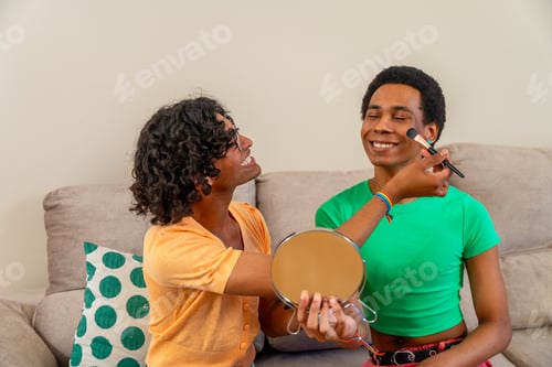 Preview: Gay couple making up sitting on the sofa at home