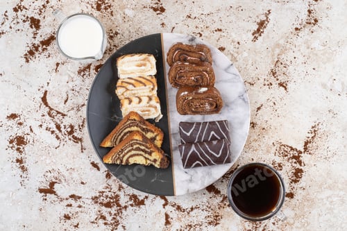 Preview: A beautiful plate with sweets and cups of drink