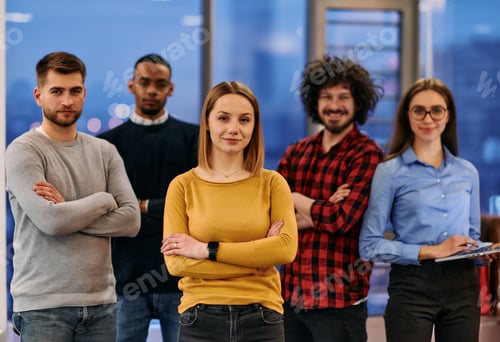 Preview: Portrait of successful creative business team looking at camera and smiling. Diverse business people