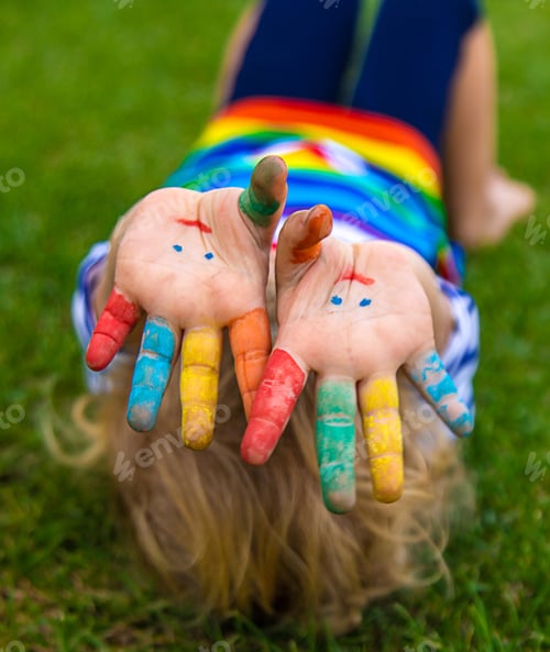 Preview: Child in hand draw smile. Selective focus.
