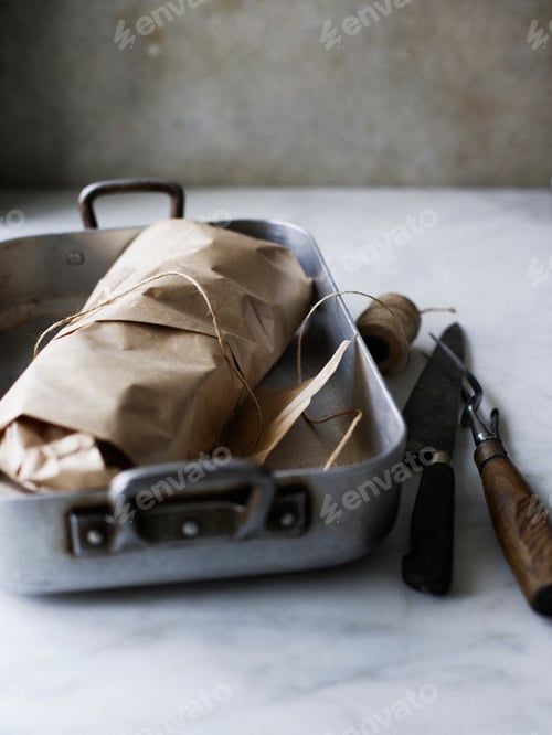 Preview: Dish of meat in butchers paper