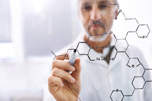 Preview: Shot of a mature male scientist working with chemistry formulas in his lab
