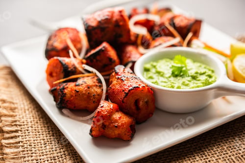 Preview: Tandoori Soya Chaap or soy chap dish prepared by marinating in tandoori spices, closeup view