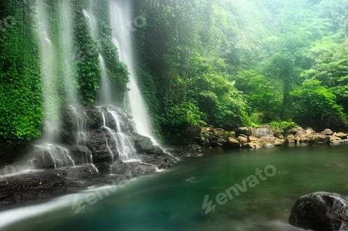 Preview: photo of water flow of a waterfall in the forest of North Bengkulu, Indonesia