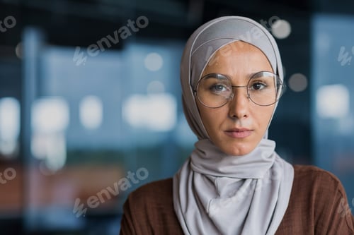 Preview: Professional Woman Wearing Glasses and Head Covering