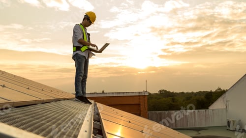 Preview: Engineer working setup Solar panel at the roof top.