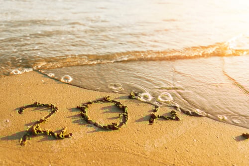 Preview: Inscription on sand 2020 under wave