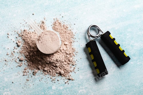 Preview: Scoops filled with protein powders for fitness nutrition to start training