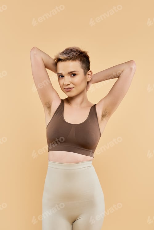 Preview: Young Woman Posing in Sports Bra and Leggings