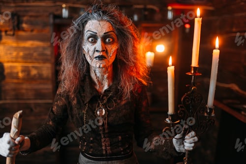 Preview: Scary witch with candlestick and cane reads spell