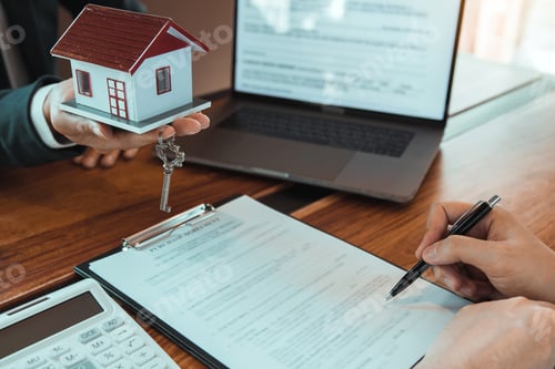Preview: Customer writing signing signature on paper contract with real estate agent with new home concept.