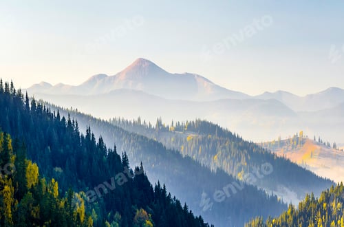 Preview: Amazing soft sunrise panorama in mountains.