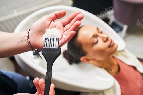 Preview: Silhouette of relaxed woman enjoying beauty procedure