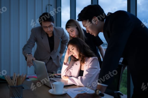 Preview: Group of broker international stock traders working actively at night in office,