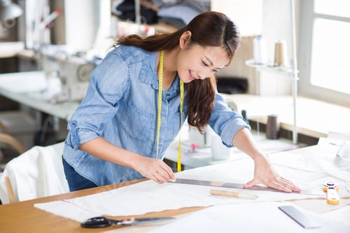 Preview: Fashion designer working in studio