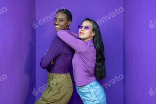 Preview: Two young beautiful smiling female carefree Positive models having fun. Cheerful and happy.